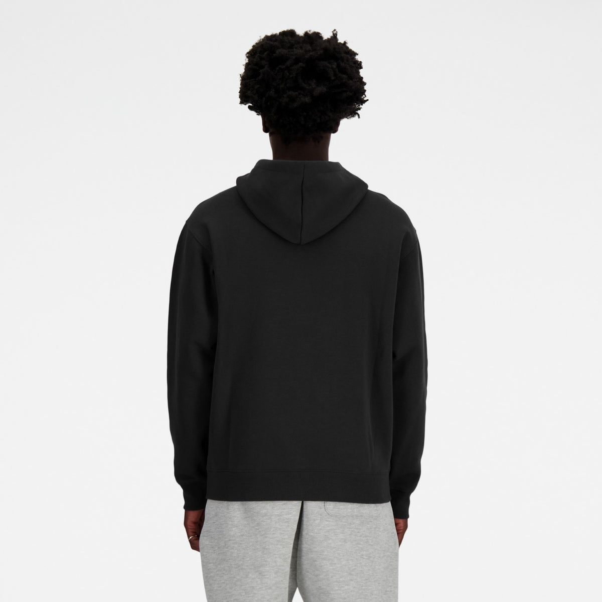Felpa New Balance Sport Essentials nera, vista posteriore