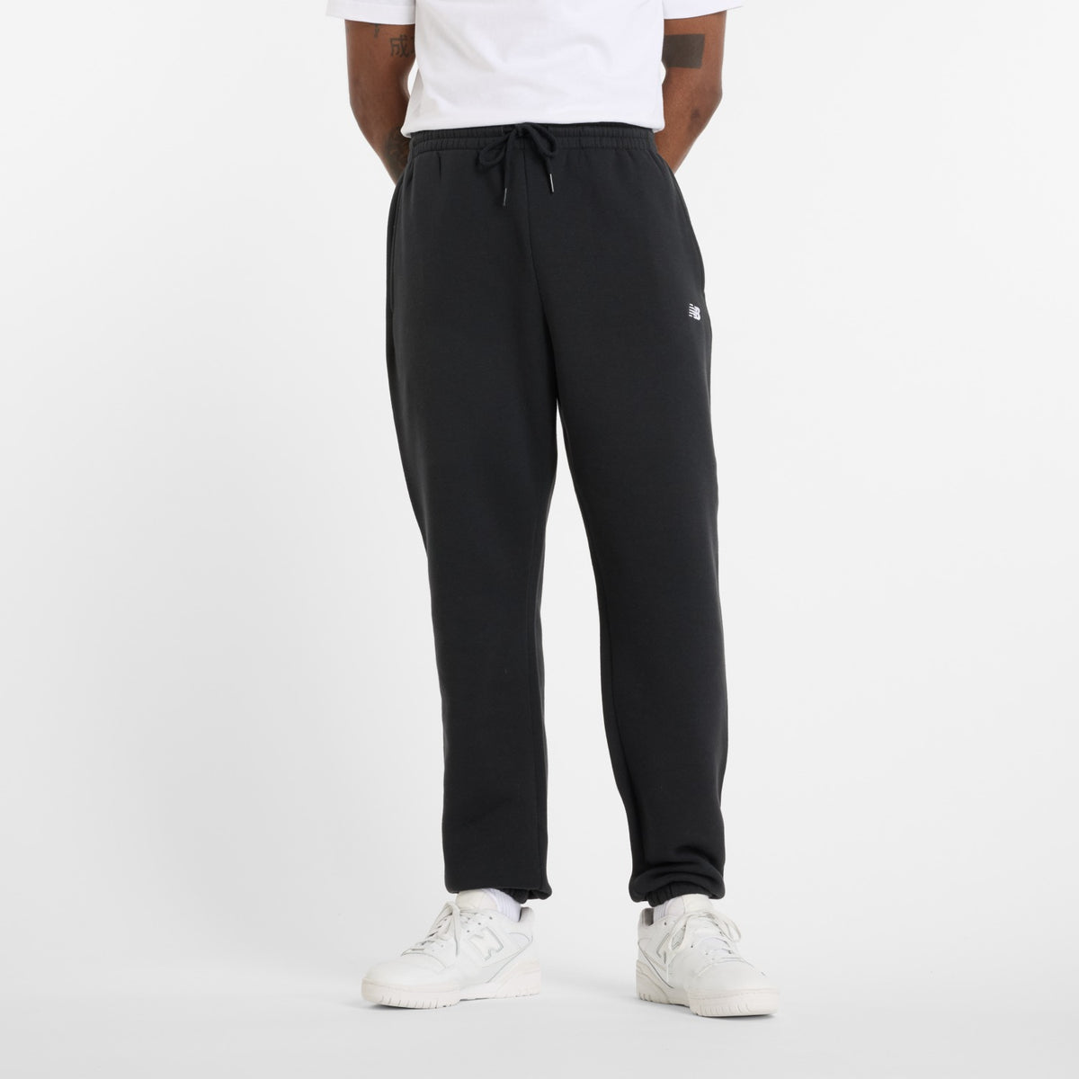Pantaloni New Balance Sport Essentials neri, vista frontale
