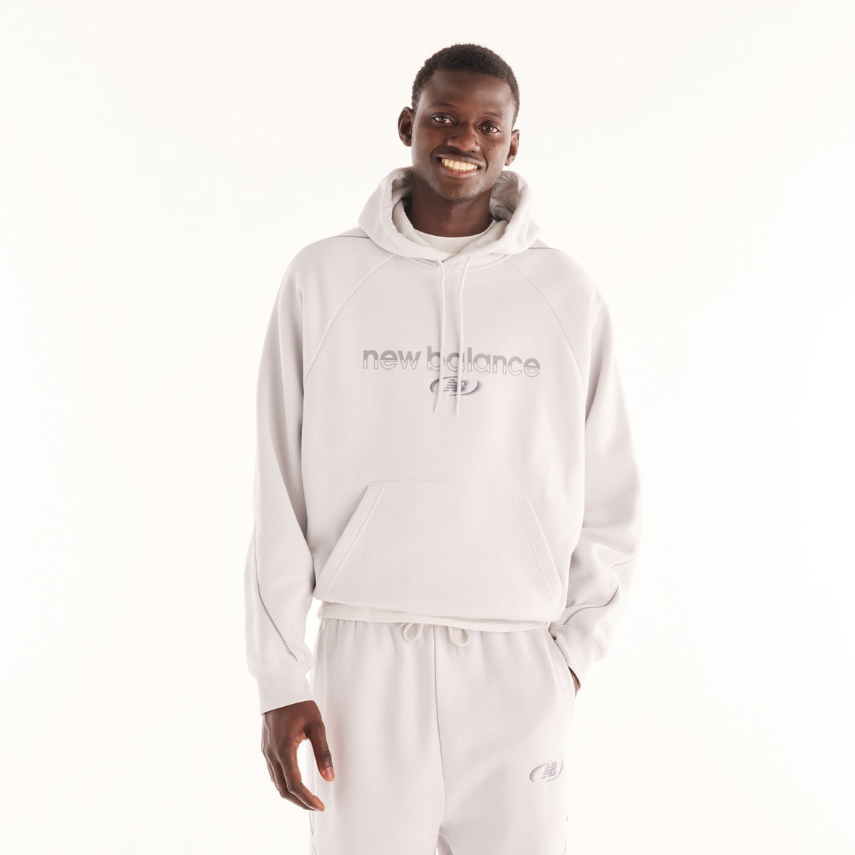 Felpa New Balance Trackside grigia, vista frontale